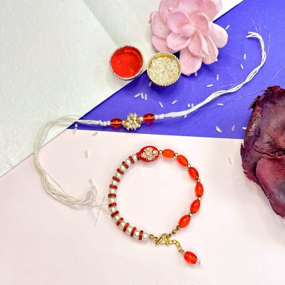 Red Gajrara Rakhi — handmade in India by Paws & Feet
