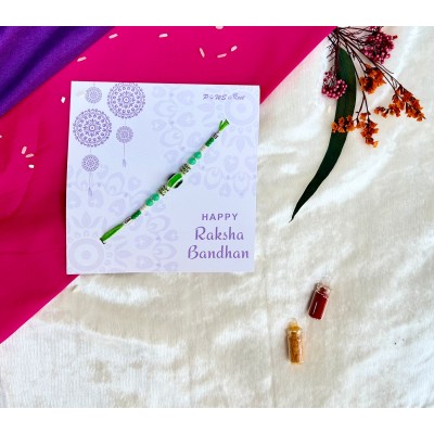 Green evil eye Rakhi — handmade in India by Paws & Feet