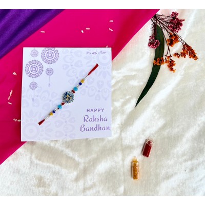 Chakra blue Rakhi — handmade in India by Paws & Feet