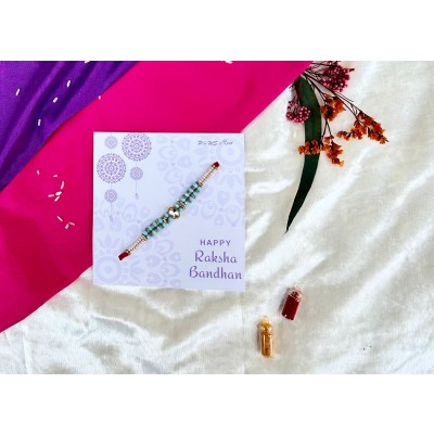 Oval stone blue Rakhi — handmade in India by Paws & Feet