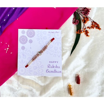 Oval stone pink Rakhi — handmade in India by Paws & Feet